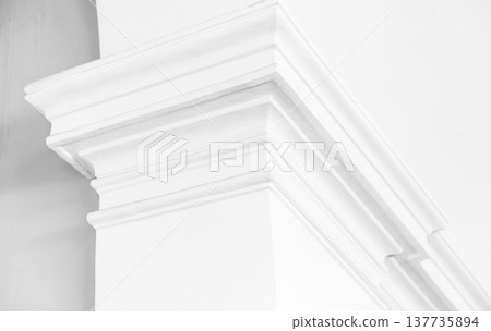 Detailed image of an intricately designed white cornice Detailed image of an intricately designed white cornice 137735894