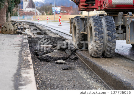 View of removed asphalt on a section of highway in the city View of removed asphalt on a section of highway in the city 137736036