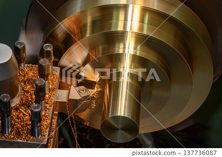 High-precision finishing process of brass material parts on a lathe machine to achieve a superior surface quality. 137736087