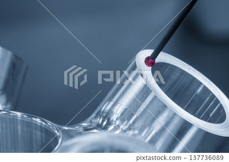 Close-up of a multi-axis CMM probe measuring high-precision aluminum parts for quality control and metrology inspection. Close-up of a multi-axis CMM probe measuring high-precision aluminum parts for quality control and metrology inspection. 137736089