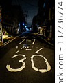 The quiet residential streets and school zones at night, with their road markings. 137736774