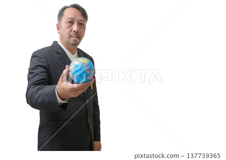 Asian Business Leader Holding Globe for Global Vision and Sustainability Concept Asian Business Leader Holding Globe for Global Vision and Sustainability Concept 137739365
