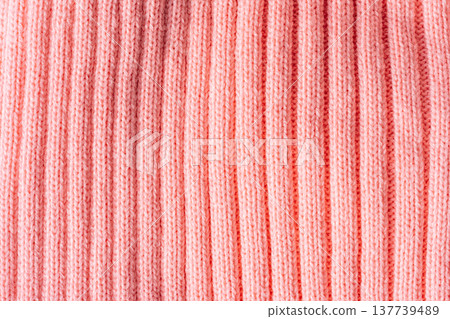 Pink ribbed knit texture background, knitted fabric surface close up 137739489
