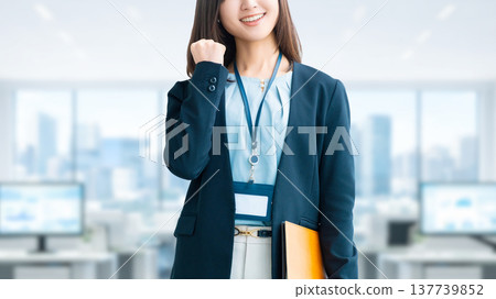Woman/businesswoman doing a fist pump Woman/businesswoman doing a fist pump 137739852