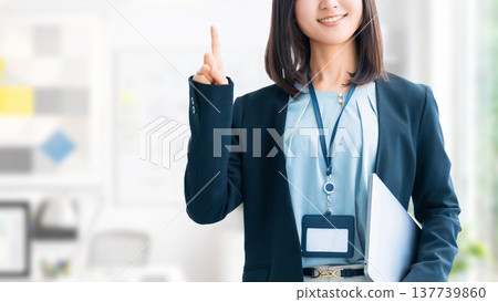 Smiling woman/businesswoman giving directions Smiling woman/businesswoman giving directions 137739860