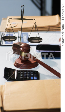 Consultation and conference of professional businesswoman and Male lawyers working and discussion having at law firm in office. Concepts of law, Judge gavel with scales of justice 137739978