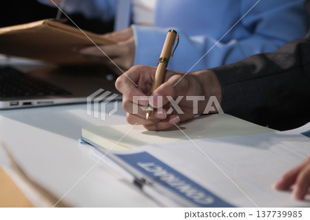 Consultation and conference of professional businesswoman and Male lawyers working and discussion having at law firm in office. Concepts of law, Judge gavel with scales of justice 137739985