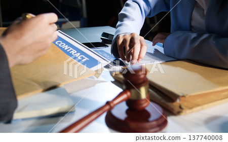 Consultation and conference of professional businesswoman and Male lawyers working and discussion having at law firm in office. Concepts of law, Judge gavel with scales of justice 137740008