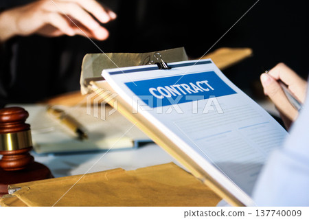 Consultation and conference of professional businesswoman and Male lawyers working and discussion having at law firm in office. Concepts of law, Judge gavel with scales of justice Consultation and conference of professional businesswoman and Male lawyers working and discussion having at law firm in office. Concepts of law, Judge gavel with scales of justice 137740009