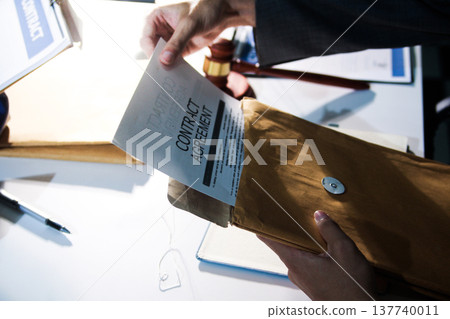 Consultation and conference of professional businesswoman and Male lawyers working and discussion having at law firm in office. Concepts of law, Judge gavel with scales of justice Consultation and conference of professional businesswoman and Male lawyers working and discussion having at law firm in office. Concepts of law, Judge gavel with scales of justice 137740011