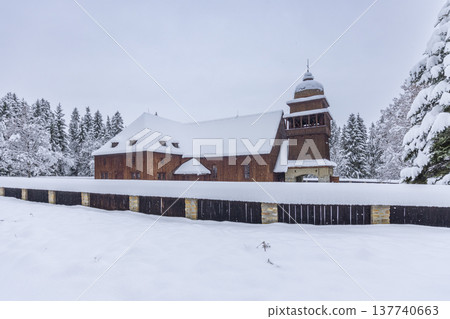 Wooden Articular Church standing in winter snow Svaty Kriz Slovakia Wooden Articular Church standing in winter snow Svaty Kriz Slovakia 137740663