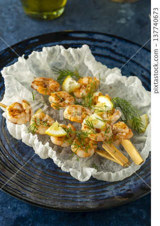 Grilled shrimp skewers with lemon and fresh dill Grilled shrimp skewers with lemon and fresh dill 137740673