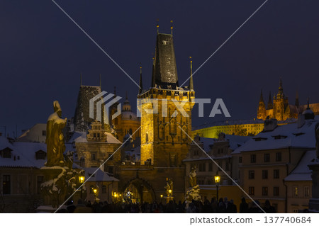 Charles Bridge Lesser Town Bridge Tower illuminating snowy night Charles Bridge Lesser Town Bridge Tower illuminating snowy night 137740684