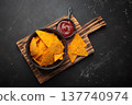 Nachos tortilla chips salsa dip wooden board Mexican Tex-Mex snack fast food 137740974