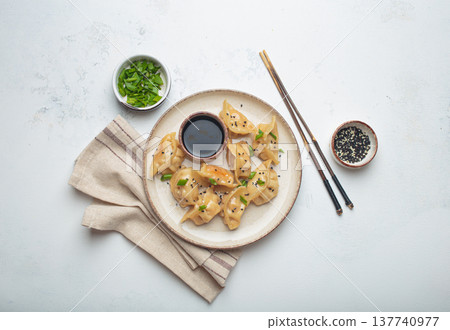 Gyoza dumplings soy sauce chopsticks asian Japanese food wontons Gyoza dumplings soy sauce chopsticks asian Japanese food wontons 137740977