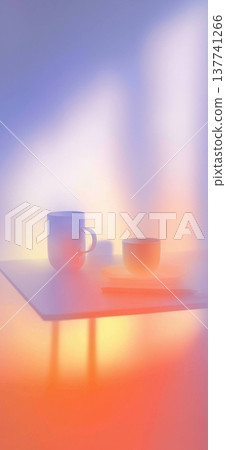 Blurry desk with mug and laptop creating home office concept. Blurry mug and laptop on desk with bright gradients representing work from home Blurry desk with mug and laptop creating home office concept. Blurry mug and laptop on desk with bright gradients representing work from home 137741266