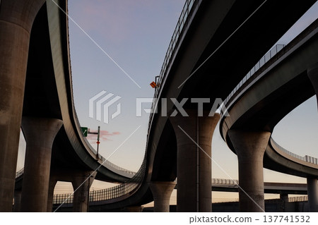 A junction with an elevated road that forms a dynamic S-curve. A junction with an elevated road that forms a dynamic S-curve. 137741532