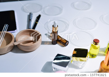 Woman making organic cosmetics with aloe in laboratory Woman making organic cosmetics with aloe in laboratory 137741821