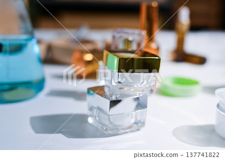 Woman making organic cosmetics with aloe in laboratory Woman making organic cosmetics with aloe in laboratory 137741822