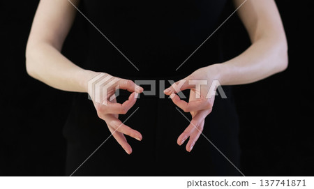 a hand symbol with a finger folded, meaning OK a hand symbol with a finger folded, meaning OK 137741871