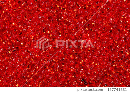 Background of bright red seed beads. Background of bright red seed beads. 137741881