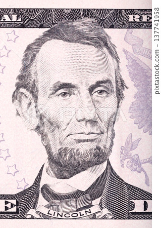 Abraham Lincoln portrait from five dollars bill. 137741958