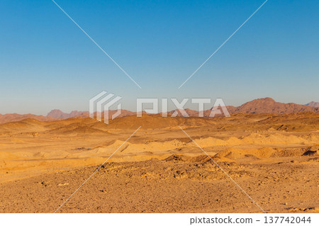 View of Arabian desert and mountain range Red Sea Hills in Egypt View of Arabian desert and mountain range Red Sea Hills in Egypt 137742044
