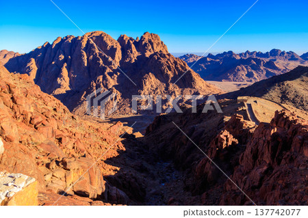 View of the rocky Sinai mountains and desert in Egypt View of the rocky Sinai mountains and desert in Egypt 137742077