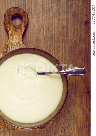 Mashed potatoes, with suluguni cheese, homemade, on a wooden table, no people, top view, Mashed potatoes, with suluguni cheese, homemade, on a wooden table, no people, top view, 137742204