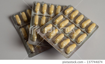 Magnesium vitamins MG in a blister on a white background 137744874