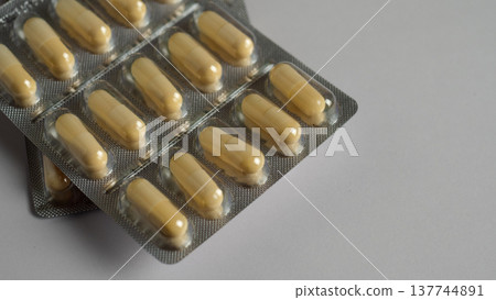Magnesium vitamins MG in a blister on a white background Magnesium vitamins MG in a blister on a white background 137744891
