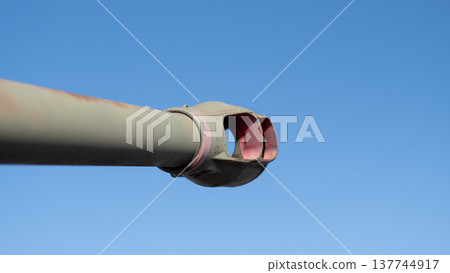 Detailed View Of Sleek Firearm Muzzle. Close Shot Highlighting Aerodynamic Tank Barrel Tip. Highly Detailed Image Showcasing Slim Design With Smooth Finish For Accurate Shooting Detailed View Of Sleek Firearm Muzzle. Close Shot Highlighting Aerodynamic Tank Barrel Tip. Highly Detailed Image Showcasing Slim Design With Smooth Finish For Accurate Shooting 137744917
