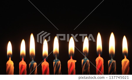 Dramatic Silhouetted Candle Scene. Black Backdrop Enhances Vivid Flames And Stark Candle Silhouettes. Moody Studio Art Featuring High Contrast Candles And Bold Minimalist Silhouettes 137745021