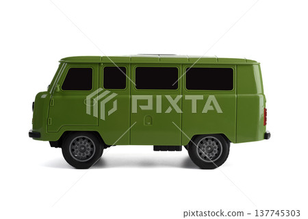 Side view of a toy model of the UAZ-452 van, also known as the "Loaf", on a white background. 137745303