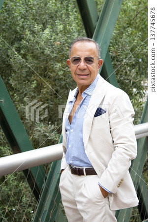 Older man with a youthful and energetic appearance Older man with a youthful and energetic appearance 137745678