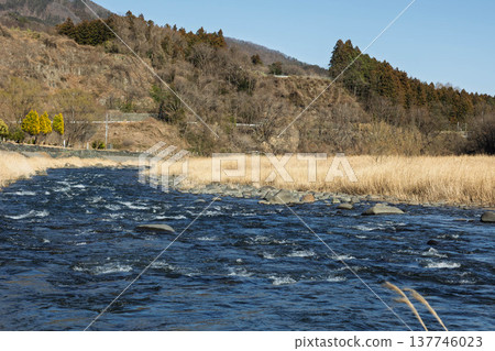The Agatsuma River in early spring, viewed from Onogami Onsen Park. The Agatsuma River in early spring, viewed from Onogami Onsen Park. 137746023