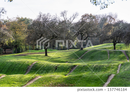 Golden autumn view in the Olympiapark in Munich, Germany, an Olympic Park for the 1972 Summer Olympics 137746184