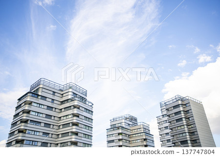 Modern Residential Buildings with a beautiful blue sky background 137747804