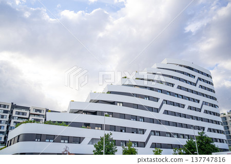 Modern Residential Buildings with a beautiful blue sky background 137747816
