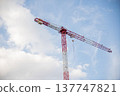 Image of a Work Crane in a Construction with the background of shiny sky 137747821