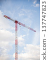 Image of a Work Crane in a Construction with the background of shiny sky 137747823