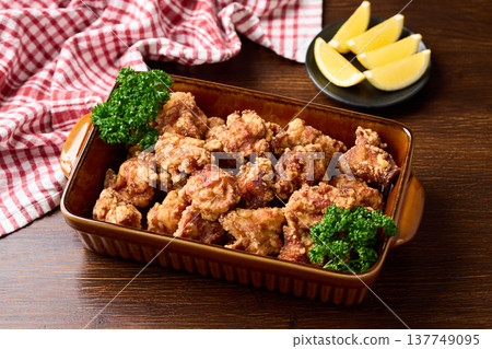 Deep fried chicken served on a large plate Deep fried chicken served on a large plate 137749095