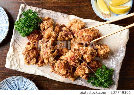 Deep fried chicken served on a large plate Deep fried chicken served on a large plate 137749305