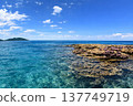 Beautiful scenery of a tropical resort with blue sea and rocky shores. 137749719