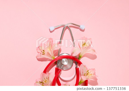 Flowers surround a stethoscope symbolizing nursing and care Flowers surround a stethoscope symbolizing nursing and care 137751336