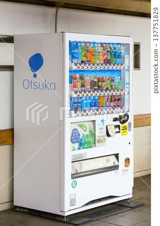 Tokyo, Japan - Sep 30 2024, Vertical close-up view of white vending machine with soft drinks at Tokyo Subway station, without people, at daytime, Tokyo, Japan Tokyo, Japan - Sep 30 2024, Vertical close-up view of white vending machine with soft drinks at Tokyo Subway station, without people, at daytime, Tokyo, Japan 137751829