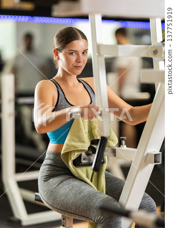 Woman doing back exercises 137751919