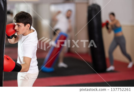 Guy boxing in training Guy boxing in training 137752261