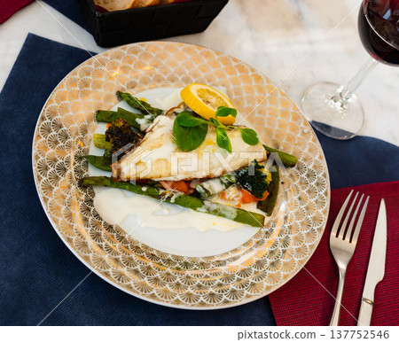 Delicious fish dish - dorado fish fillet served with vegetables 137752546