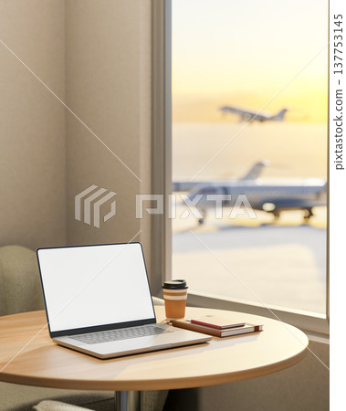 White screen laptop with book and coffee on round wood table in airport's cafe and plane over window White screen laptop with book and coffee on round wood table in airport's cafe and plane over window 137753145